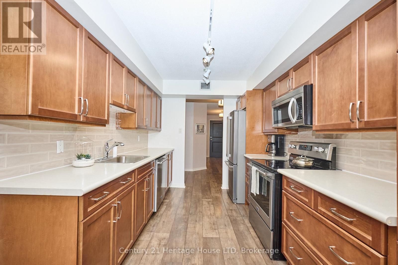 Stainless Steel Appliances - 317 - 8111 Forest Glen Drive, Niagara Falls (Mt. Carmel), ON - Indoor Photo Showing Kitchen