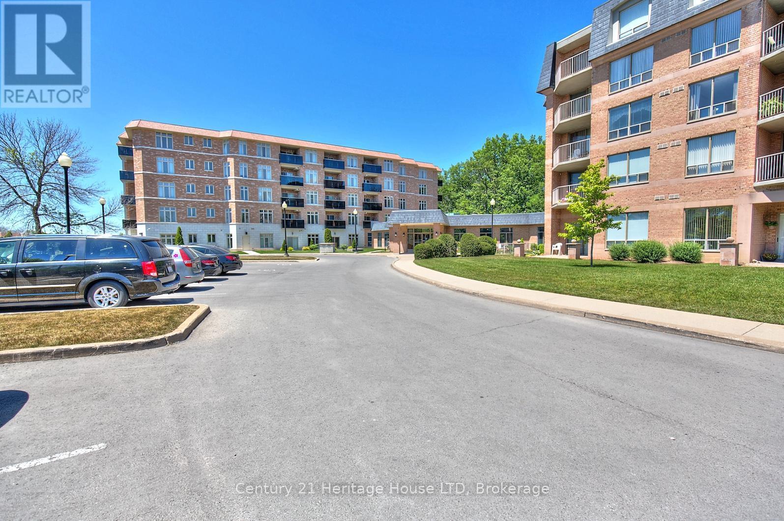 317 - 8111 Forest Glen Drive, Niagara Falls (Mt. Carmel), ON - Outdoor With Facade