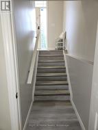 Foyer, looking up from lower level -