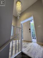 Foyer, looking up from lower level -