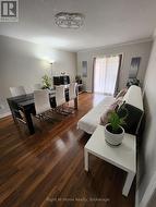 Main level: Living/dining room with w/o to deck -