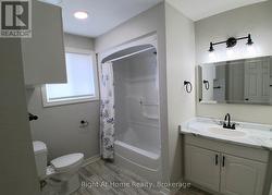 Main level: 4pc bathroom (also cheater ensuite) -