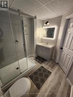 Lower level: Modern 3pc bathroom -
