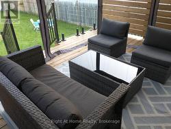 Upgraded deck w/ privacy fencing, glass panels -