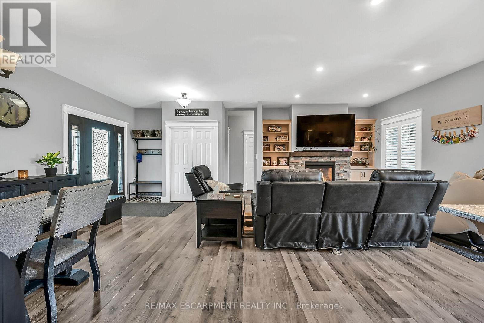 236 #55 Haldimand Road, Haldimand, ON - Indoor Photo Showing Dining Room With Fireplace