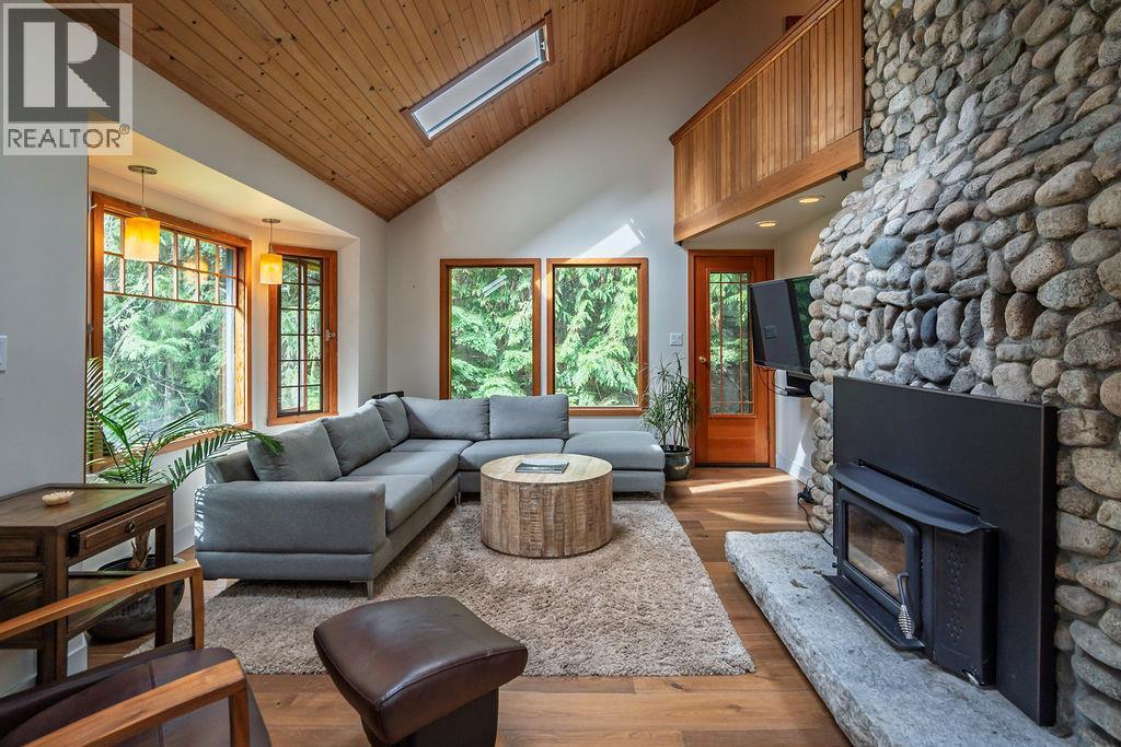 4225 3A Highway, Nelson, BC - Indoor Photo Showing Living Room With Fireplace