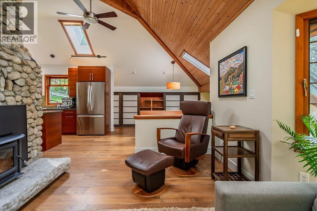 4225 3A Highway, Nelson, BC - Indoor Photo Showing Other Room With Fireplace