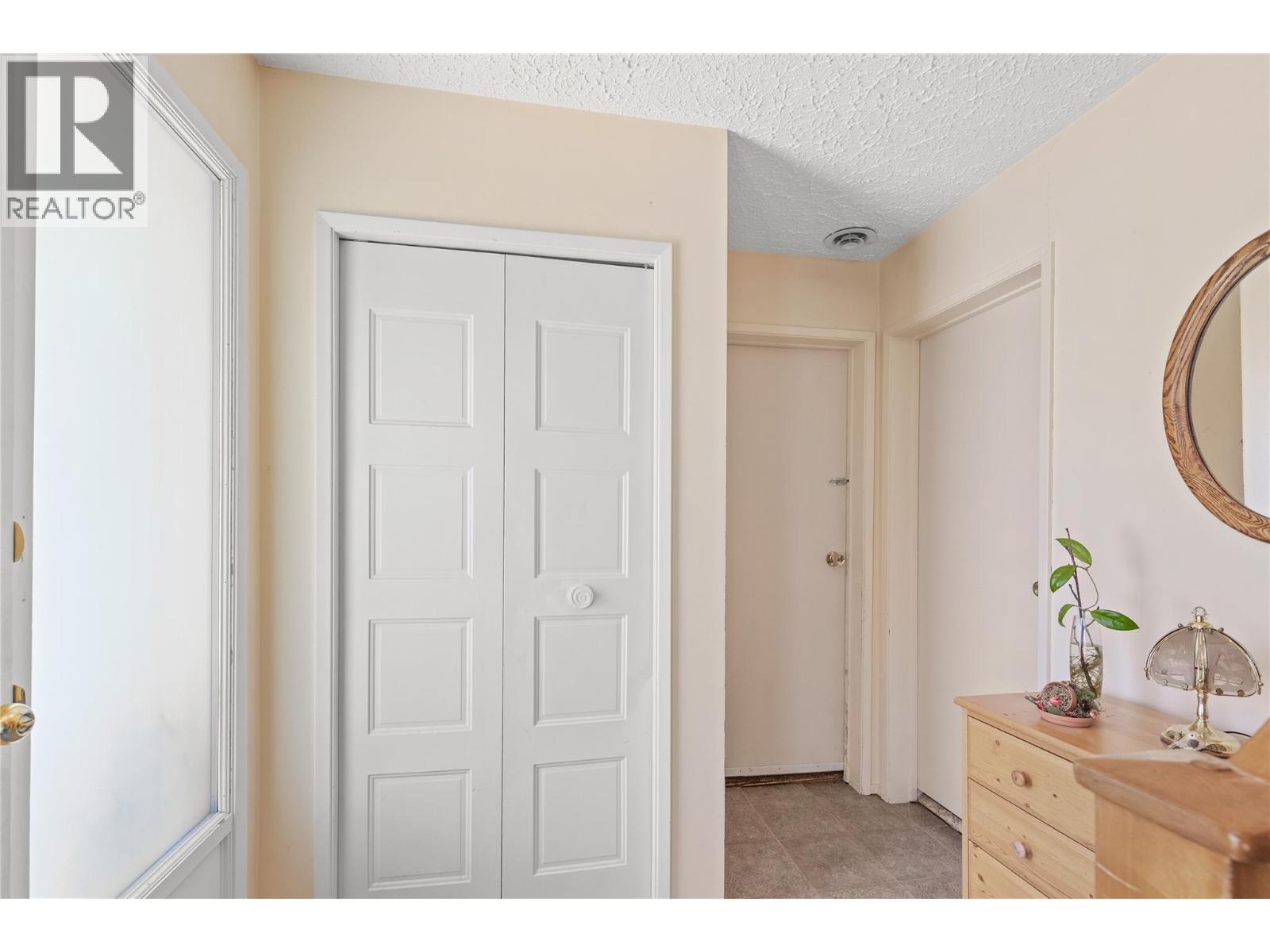 ENTRY HALLWAY - With hall closet! - 3011 11 Street, Vernon, BC - Indoor
