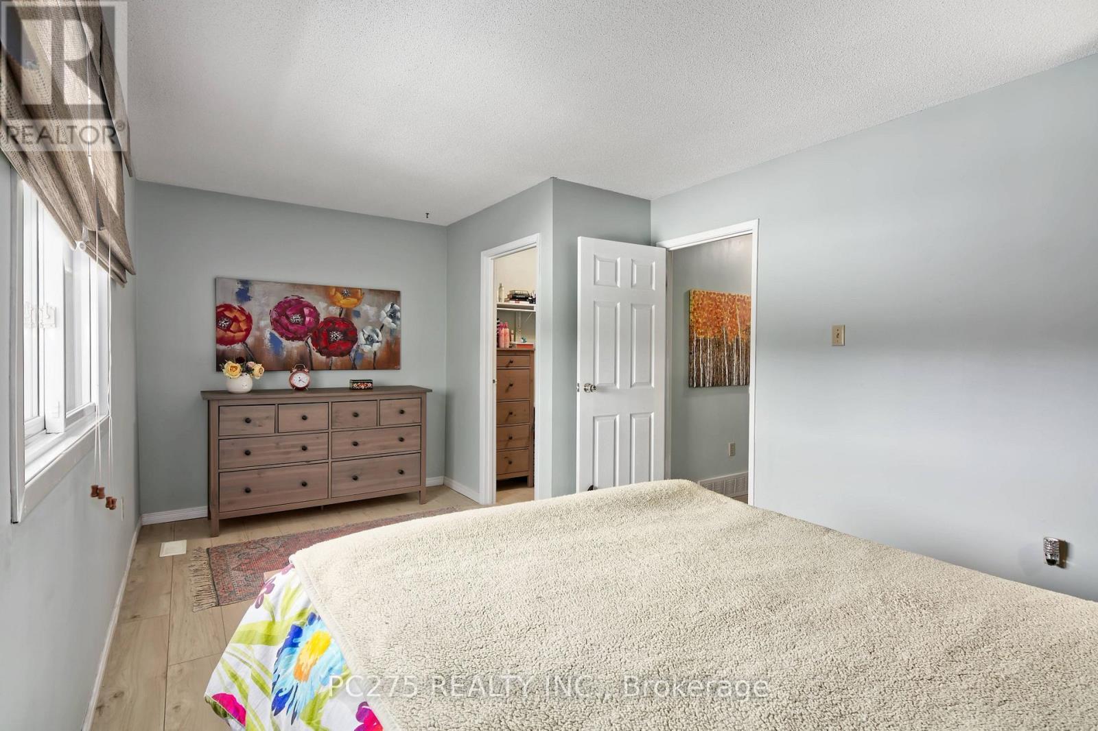 24 - 301 Carlow Road, Central Elgin, ON - Indoor Photo Showing Bedroom