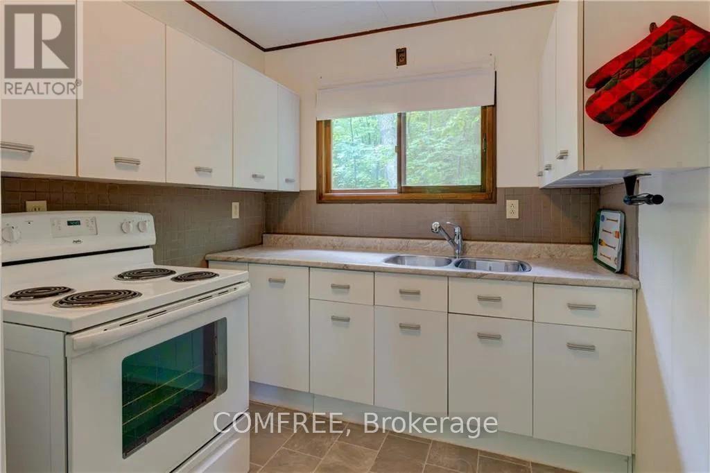 199 West Devil Lake Lane, Frontenac (Frontenac South), ON - Indoor Photo Showing Kitchen With Double Sink