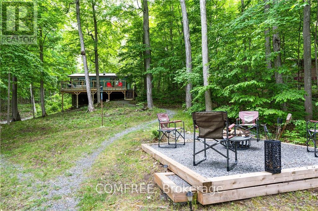 199 West Devil Lake Lane, Frontenac (Frontenac South), ON - Outdoor With Deck Patio Veranda