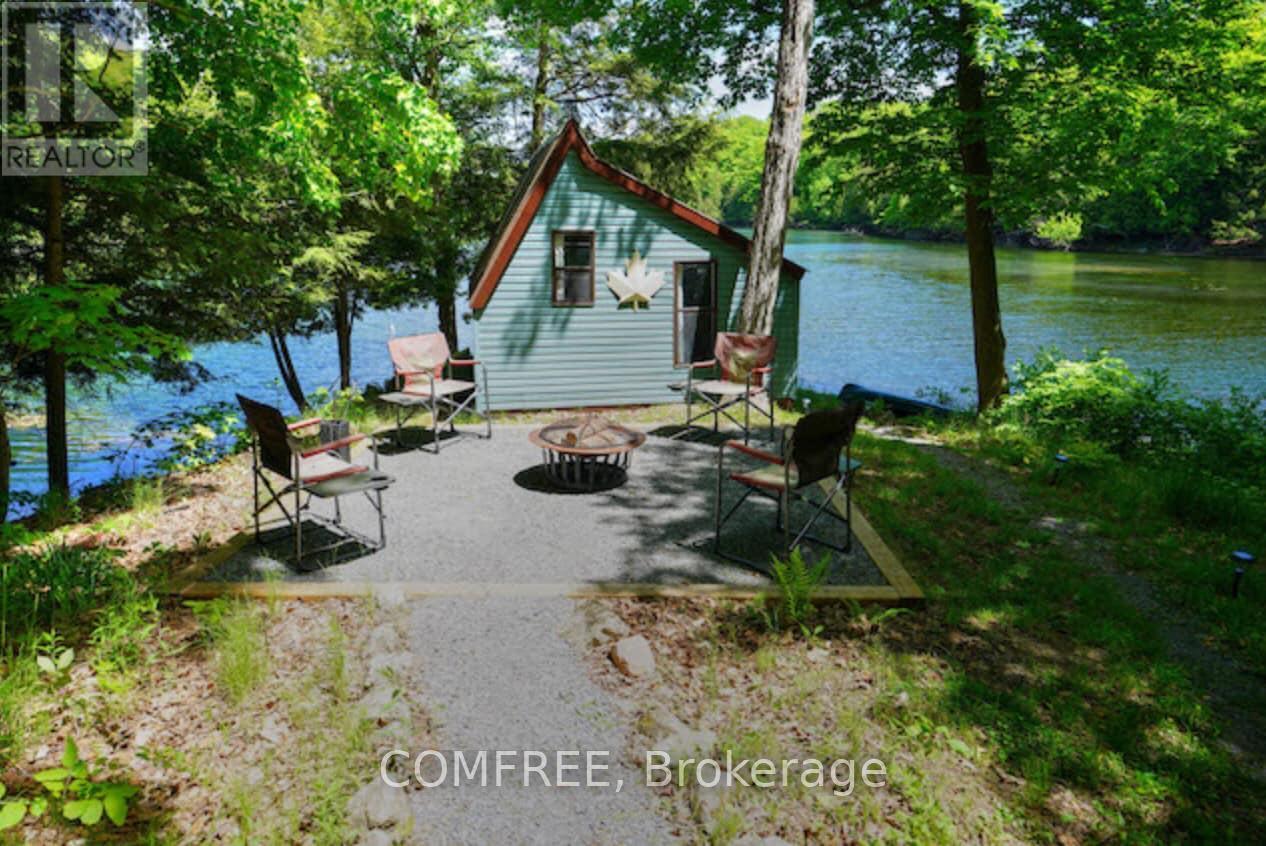 199 West Devil Lake Lane, Frontenac (Frontenac South), ON - Outdoor With Body Of Water