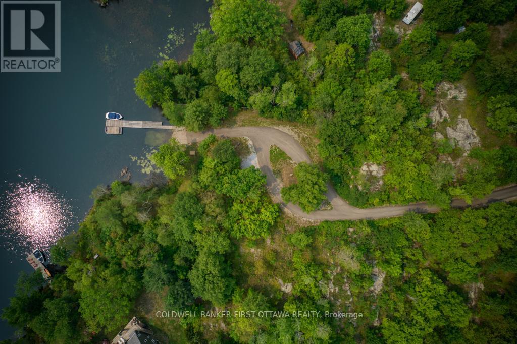 Residents share ownership of waterfront & trails - 16 Grey Owl Road, Frontenac (Frontenac South), ON