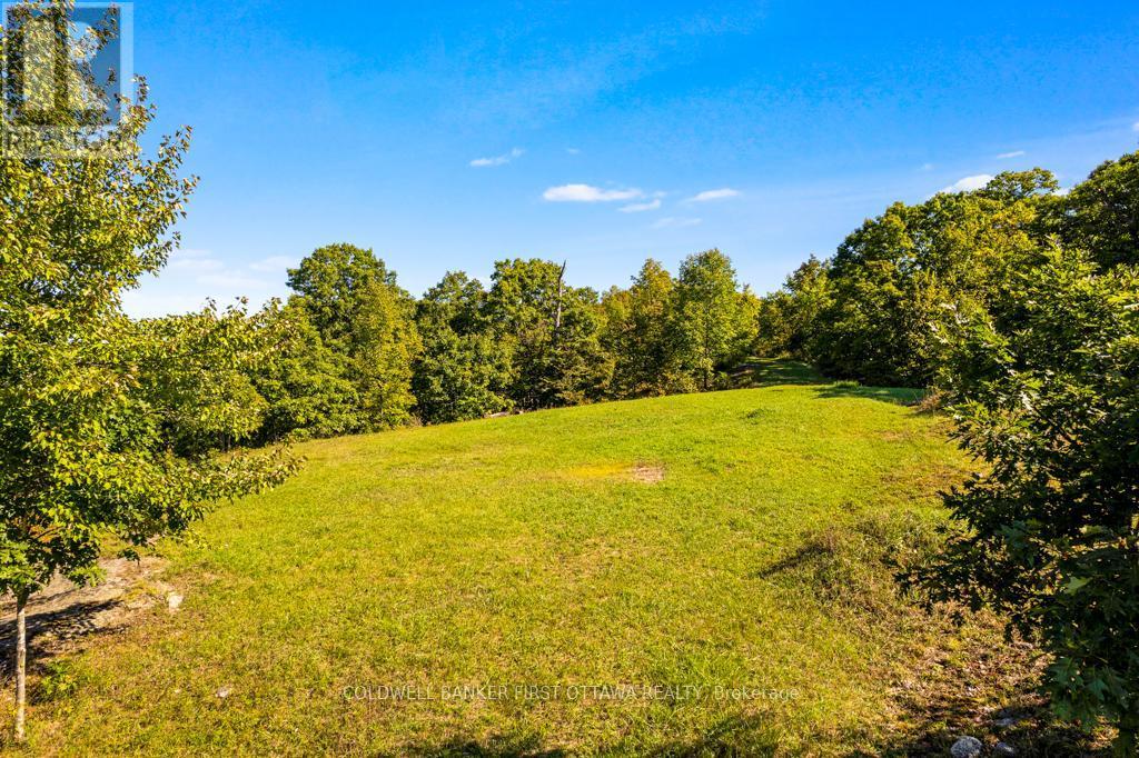 Picturesque treed setting - 16 Grey Owl Road, Frontenac (Frontenac South), ON