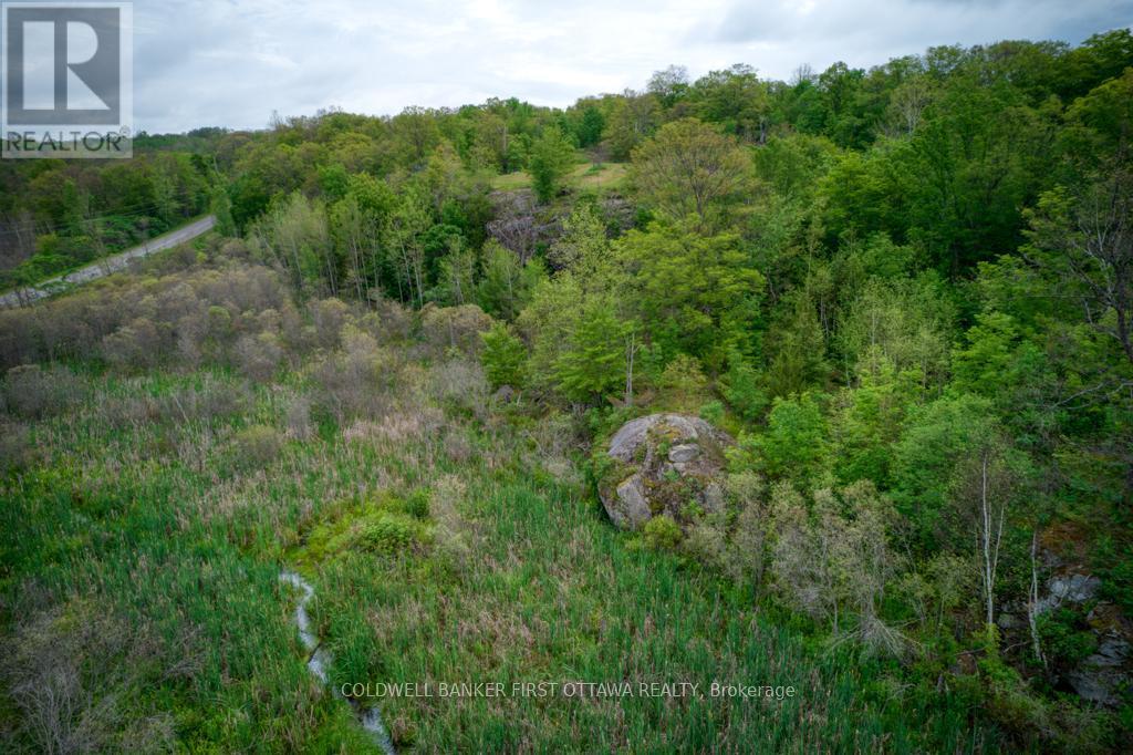 Rock outcropping - 16 Grey Owl Road, Frontenac (Frontenac South), ON