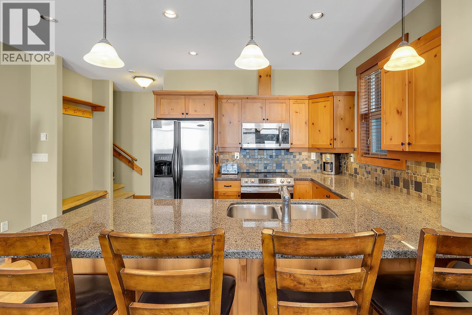 255 Raven Ridge Road Unit# 1, Big White, BC - Indoor Photo Showing Kitchen With Double Sink
