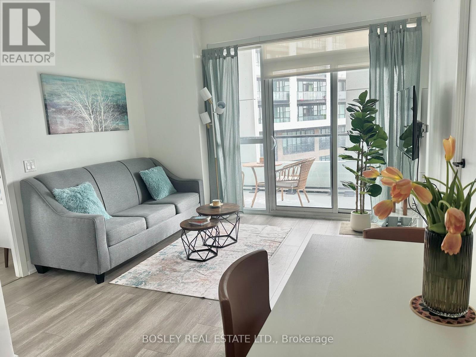 407 - 50 George Butchart Drive, Toronto, ON - Indoor Photo Showing Living Room