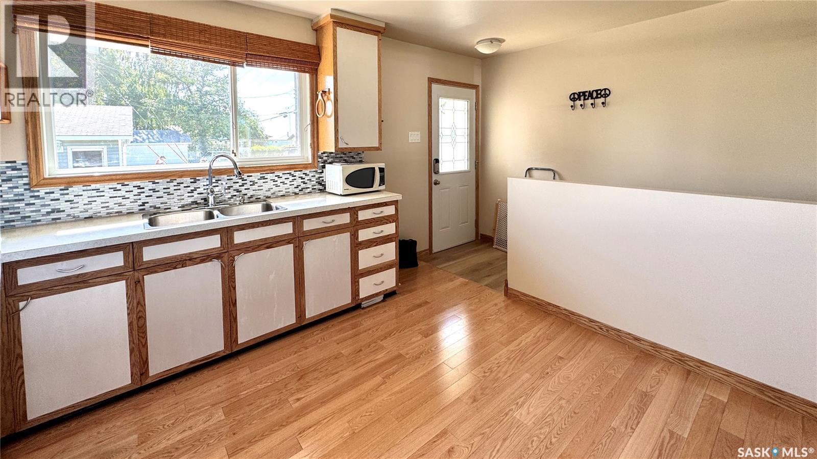 110 Stanley Street, Elbow, SK - Indoor Photo Showing Kitchen With Double Sink