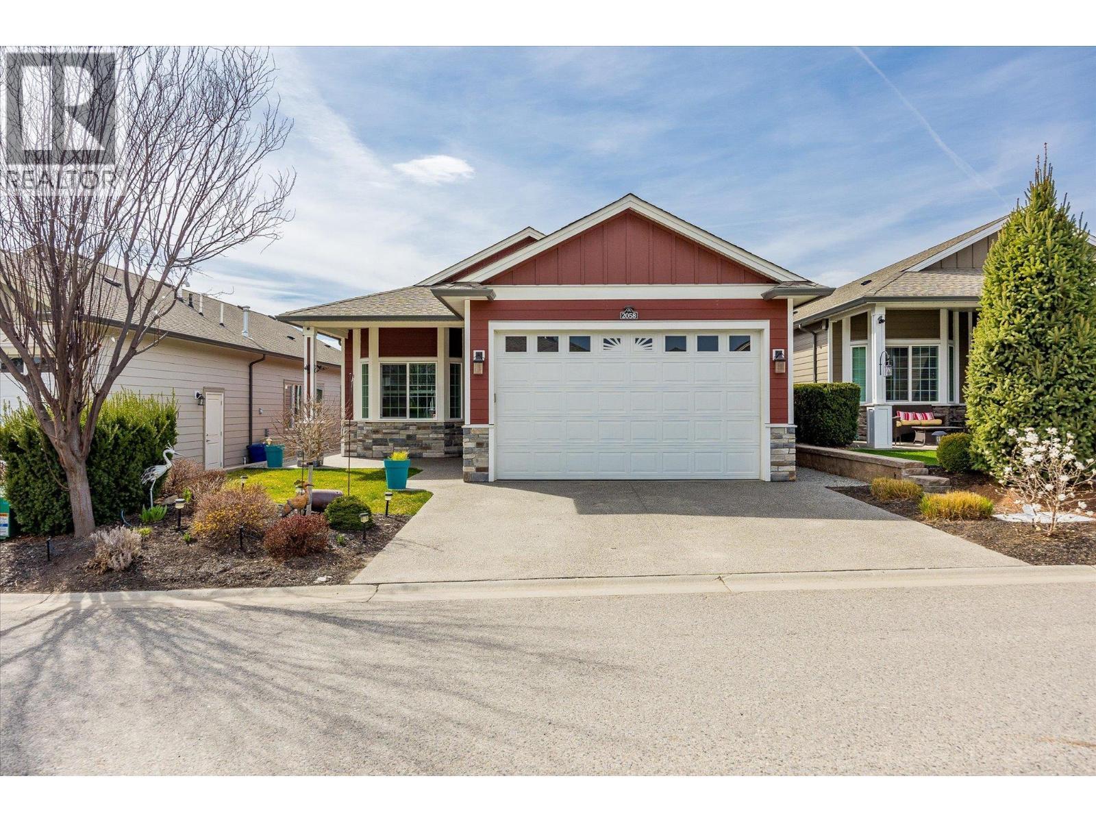 2058 Aspen Drive, Westbank, BC - Outdoor With Facade