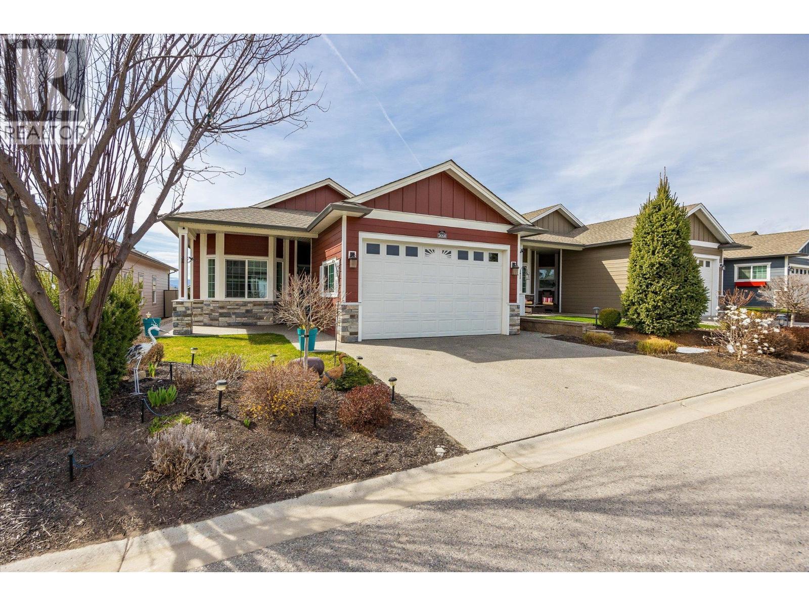 2058 Aspen Drive, Westbank, BC - Outdoor With Facade