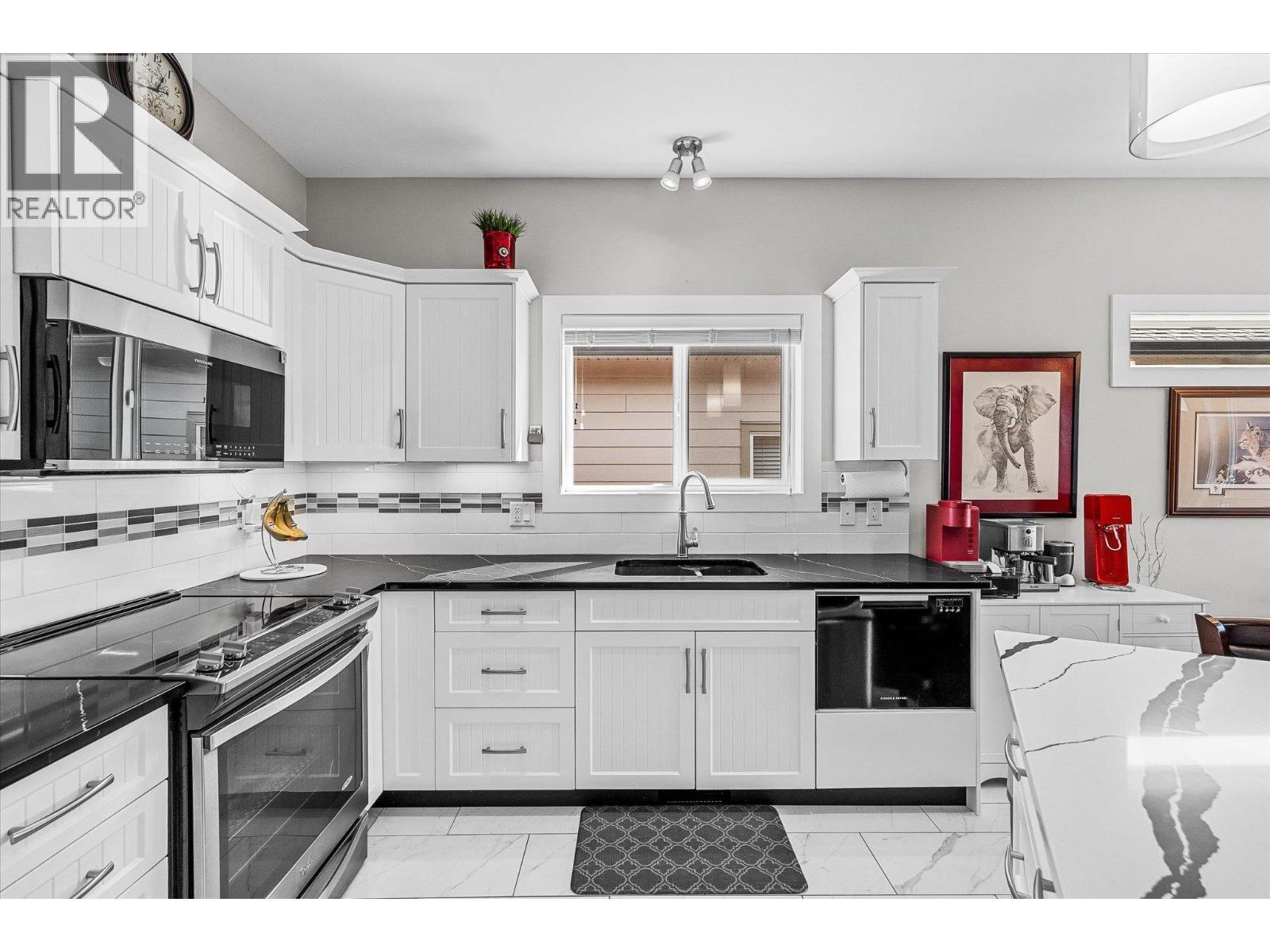 2058 Aspen Drive, Westbank, BC - Indoor Photo Showing Kitchen With Double Sink