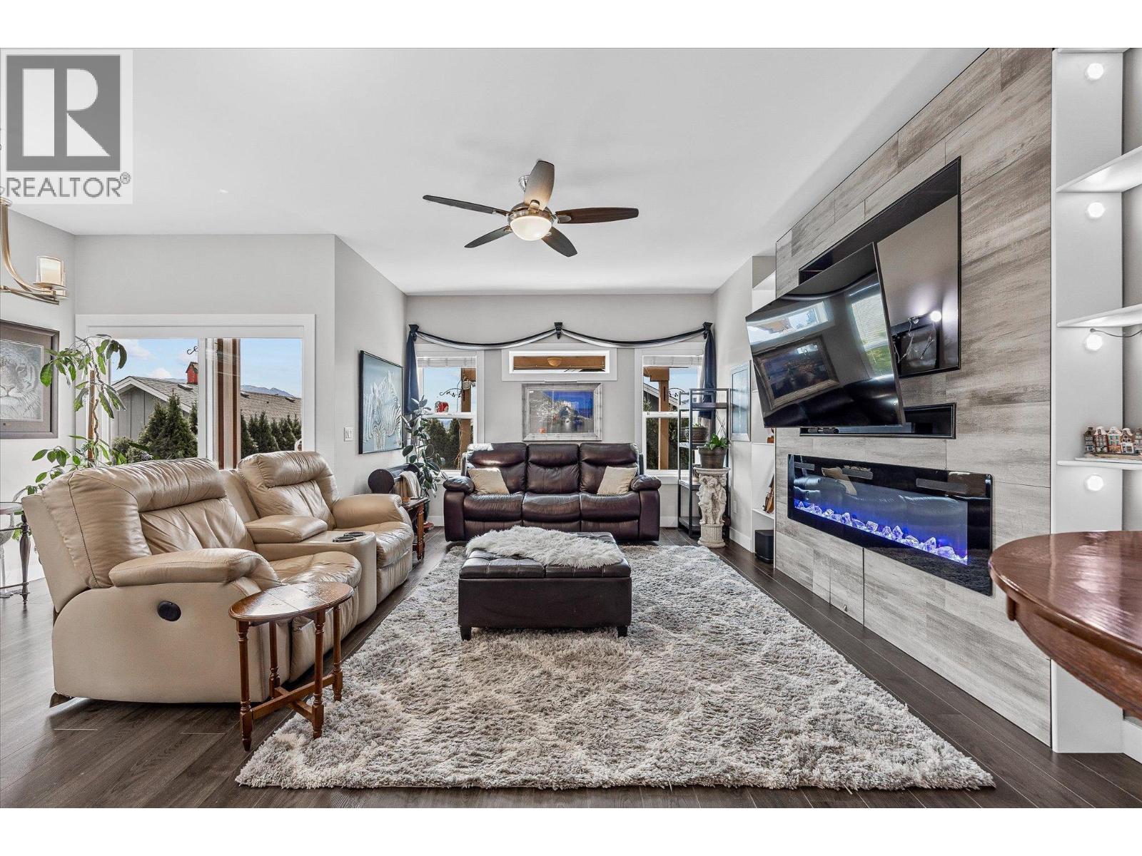 2058 Aspen Drive, Westbank, BC - Indoor Photo Showing Living Room With Fireplace