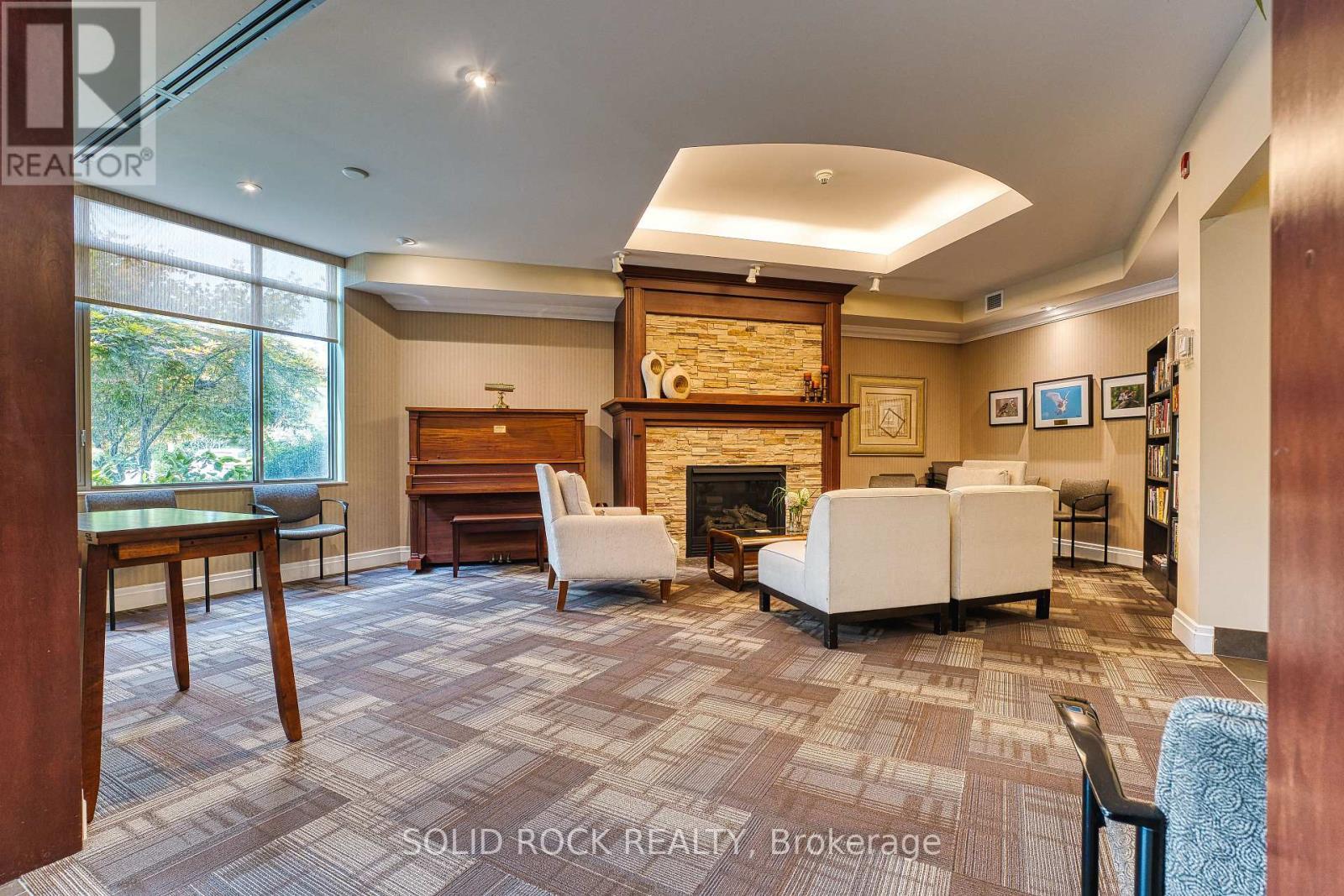 103 - 400 Romeo Street N, Stratford, ON - Indoor With Fireplace