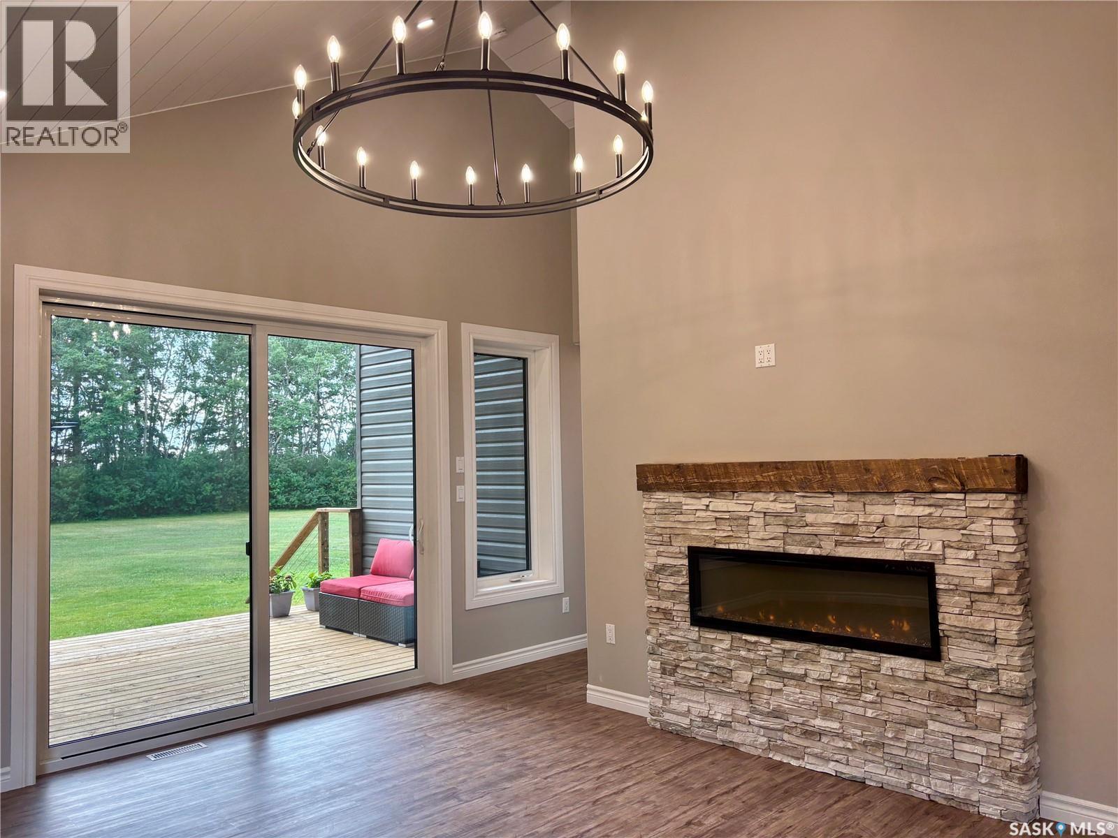 Siklenka Homestead, Parkdale Rm No. 498, SK - Indoor Photo Showing Living Room With Fireplace