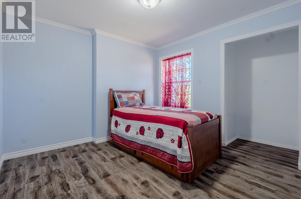 40 Main Road, Bristol'S Hope, NL - Indoor Photo Showing Bedroom
