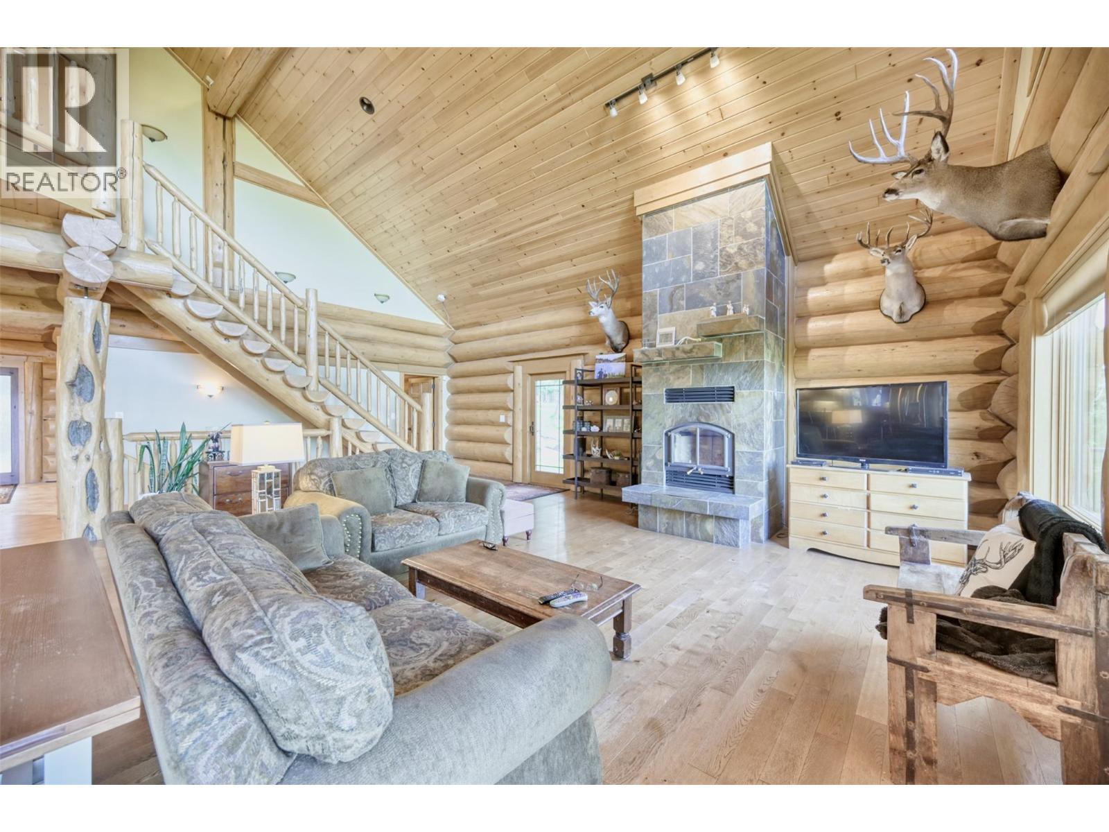 6470 Mckinney Road, Oliver, BC - Indoor Photo Showing Living Room With Fireplace