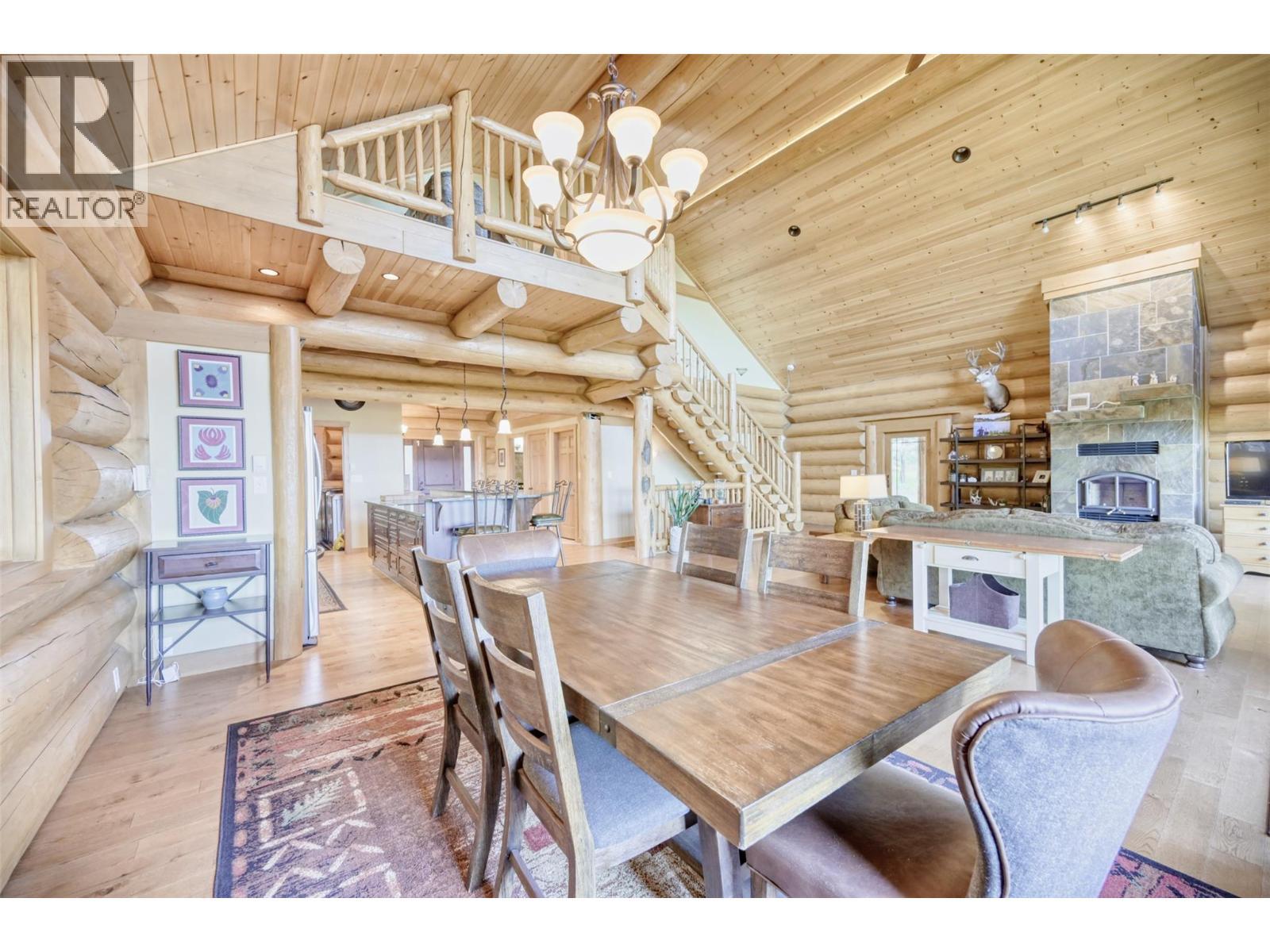 6470 Mckinney Road, Oliver, BC - Indoor Photo Showing Dining Room With Fireplace