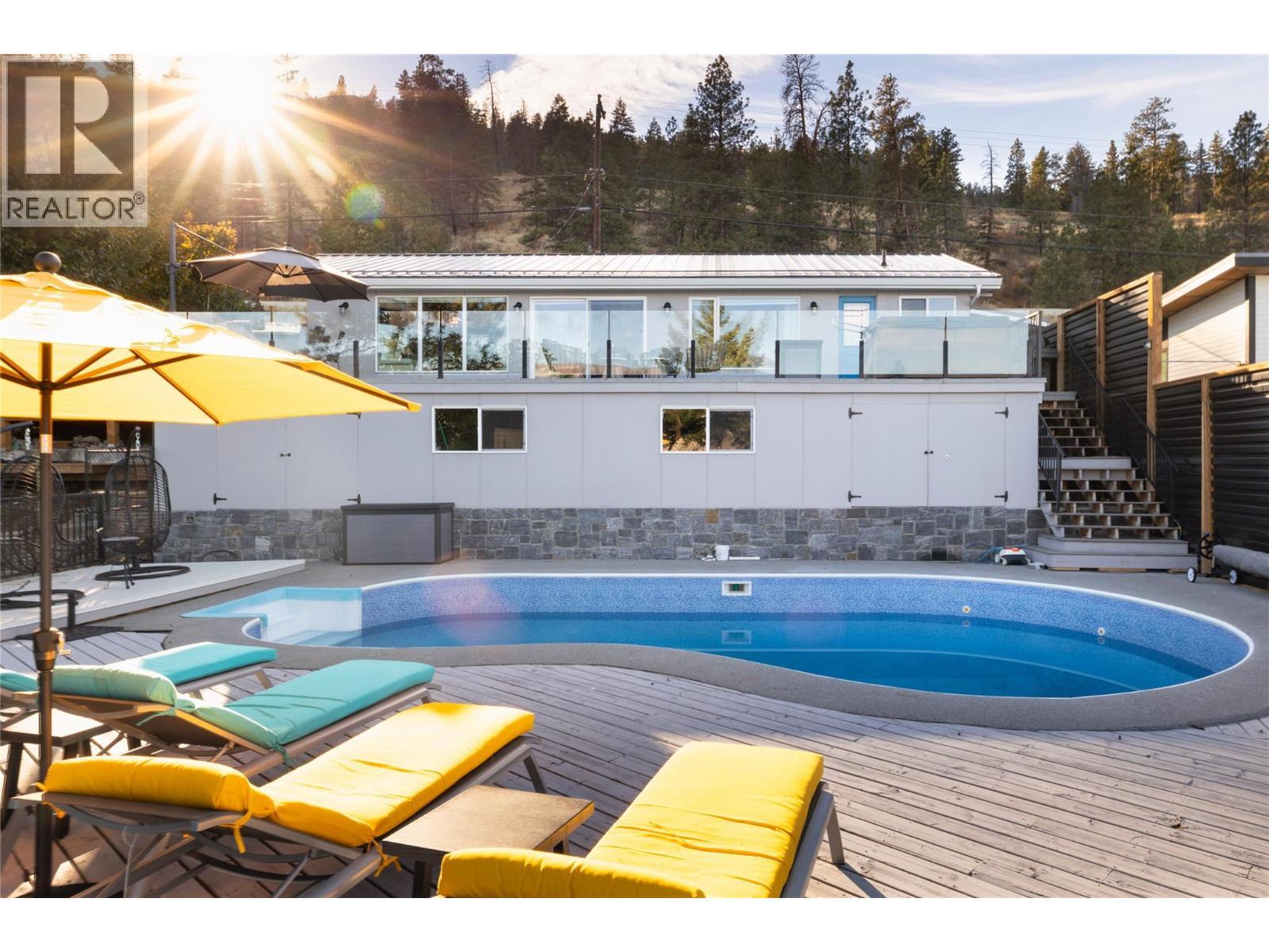 7192 Brent Road, Peachland, BC - Outdoor With In Ground Pool With Deck Patio Veranda
