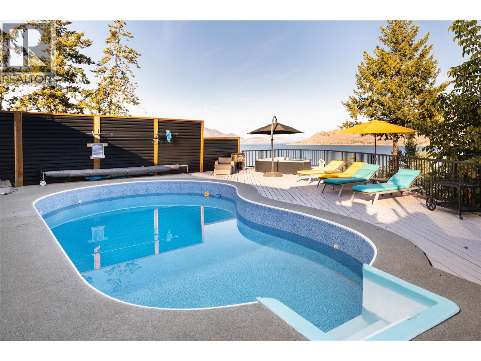 7192 Brent Road, Peachland, BC - Outdoor With In Ground Pool With Deck Patio Veranda With Backyard