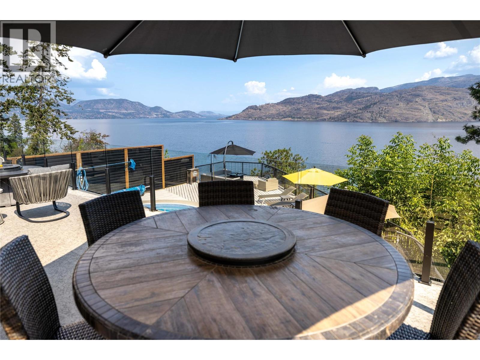 7192 Brent Road, Peachland, BC - Outdoor With Body Of Water With Deck Patio Veranda With View With Exterior