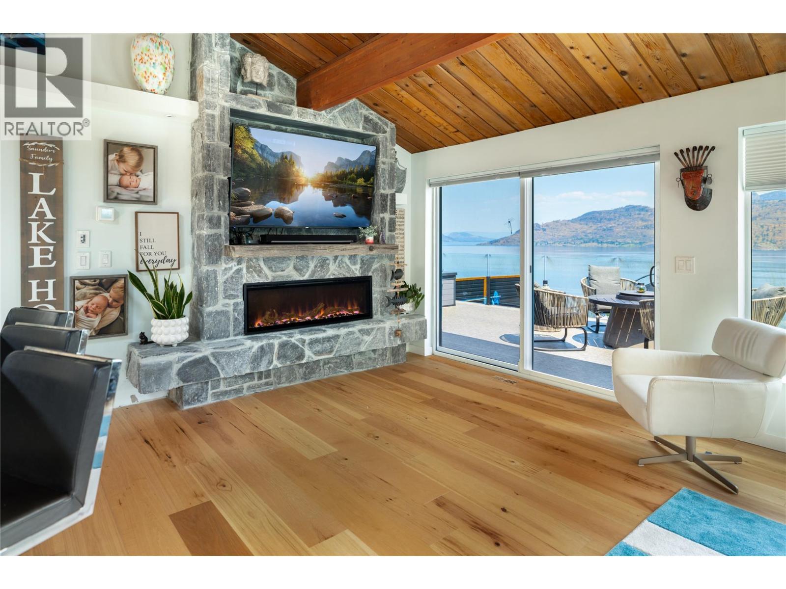 7192 Brent Road, Peachland, BC - Indoor Photo Showing Living Room With Fireplace