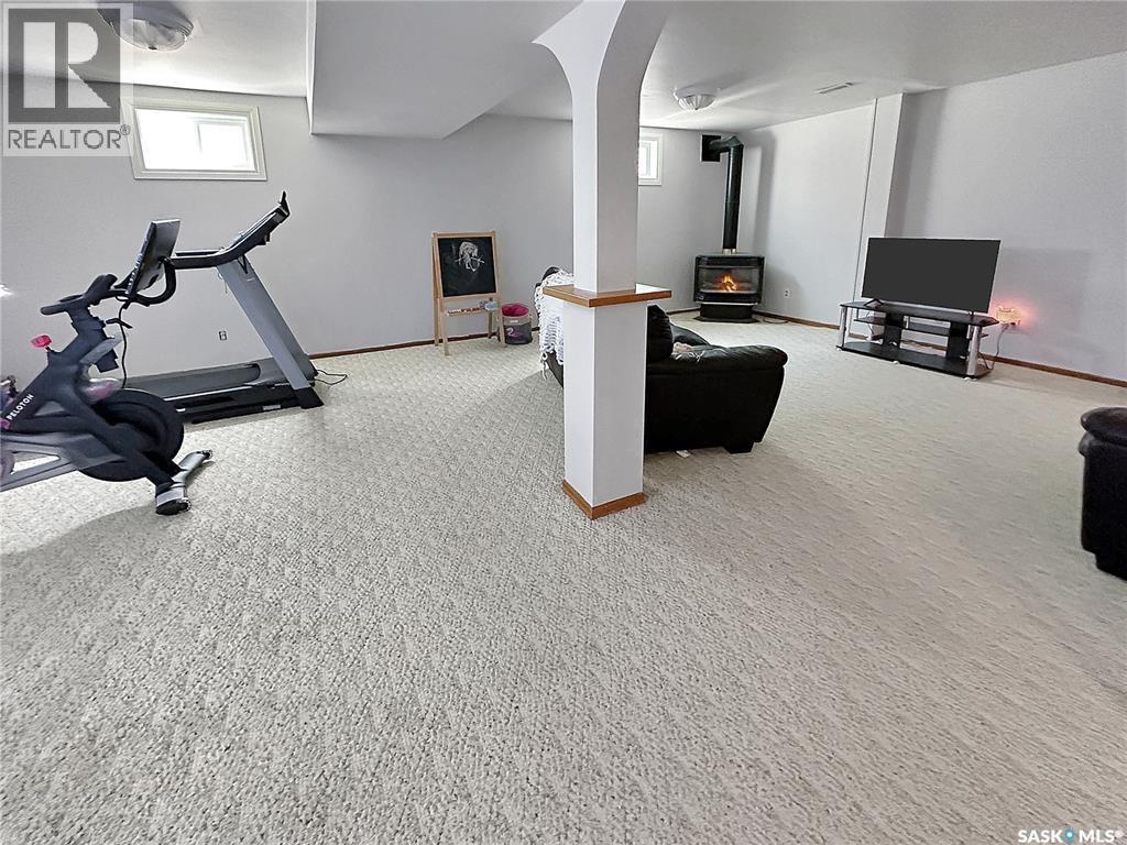 219 4Th Avenue, Whitewood, SK - Indoor Photo Showing Gym Room