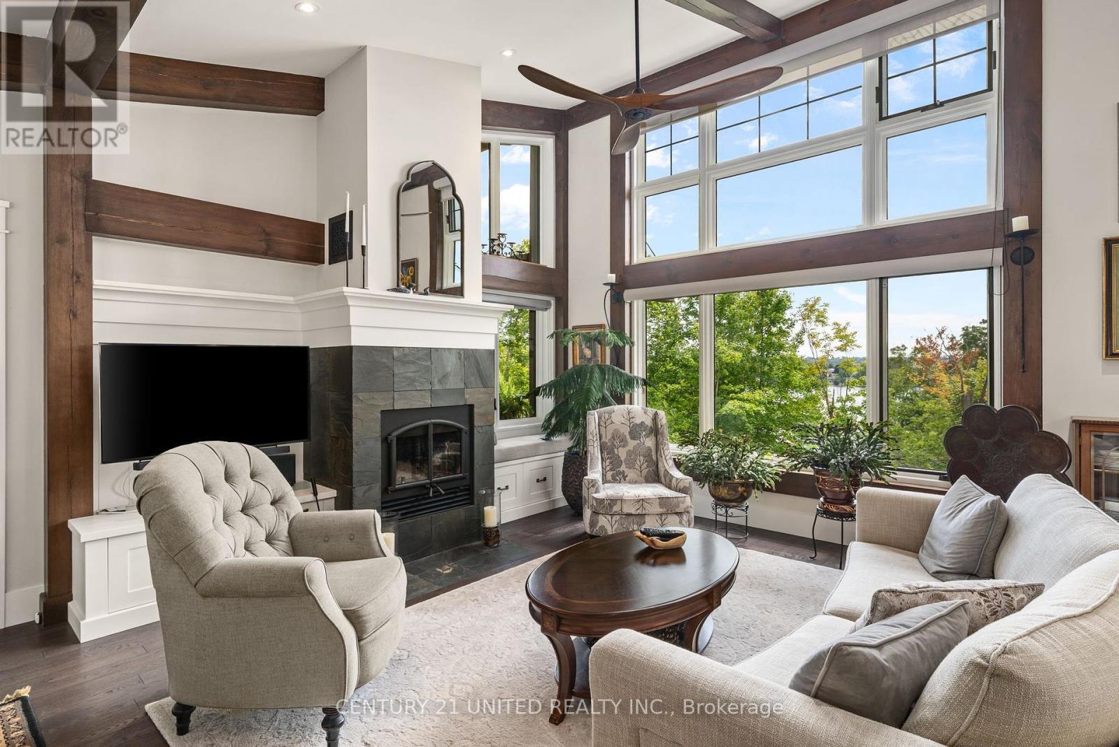 72 Darling Drive, Selwyn, ON - Indoor Photo Showing Living Room With Fireplace