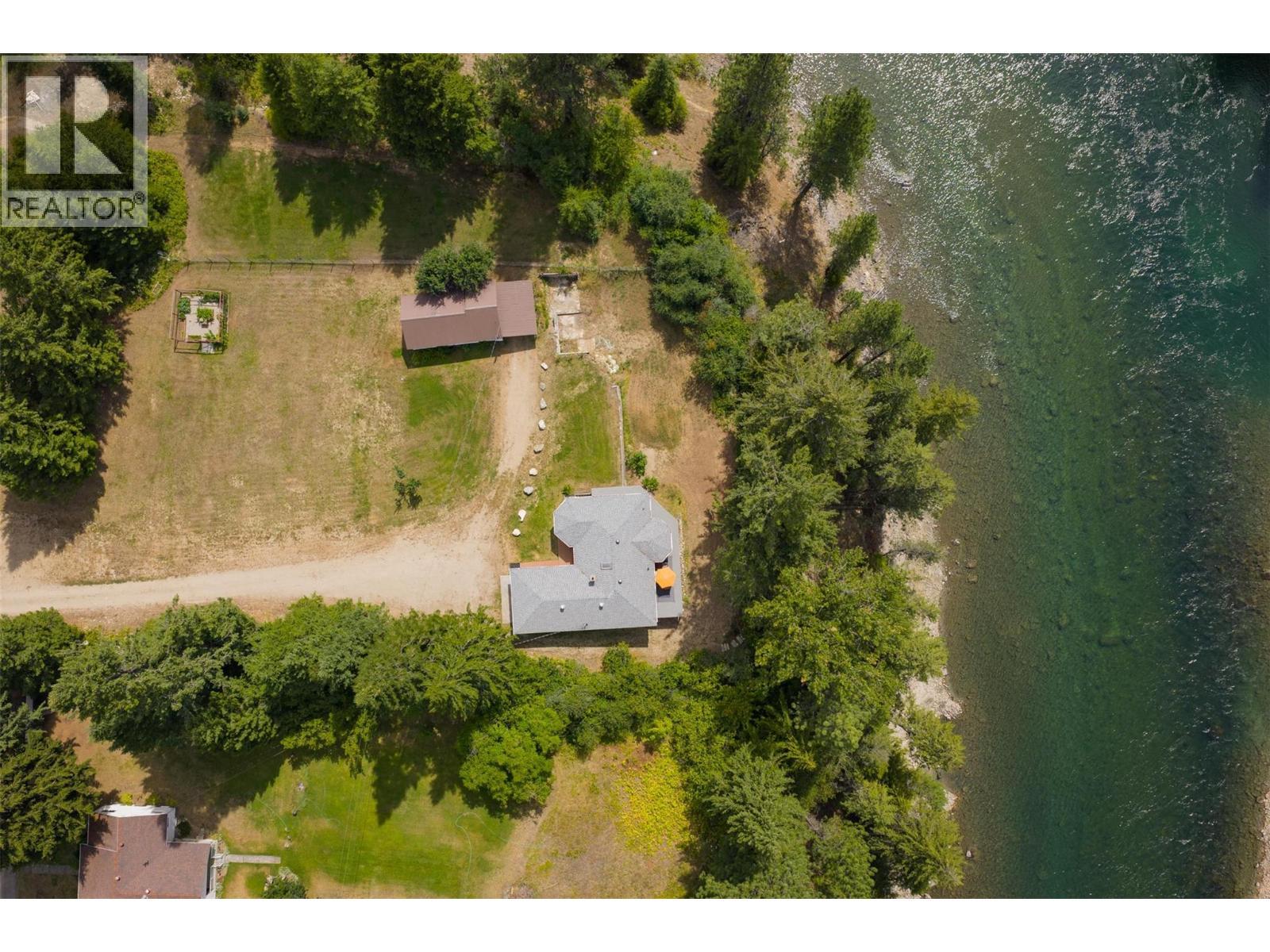 151 feet of river frontage on the iconic Slocan River. - 2697 Osachoff Road, South Slocan, BC - Outdoor With View