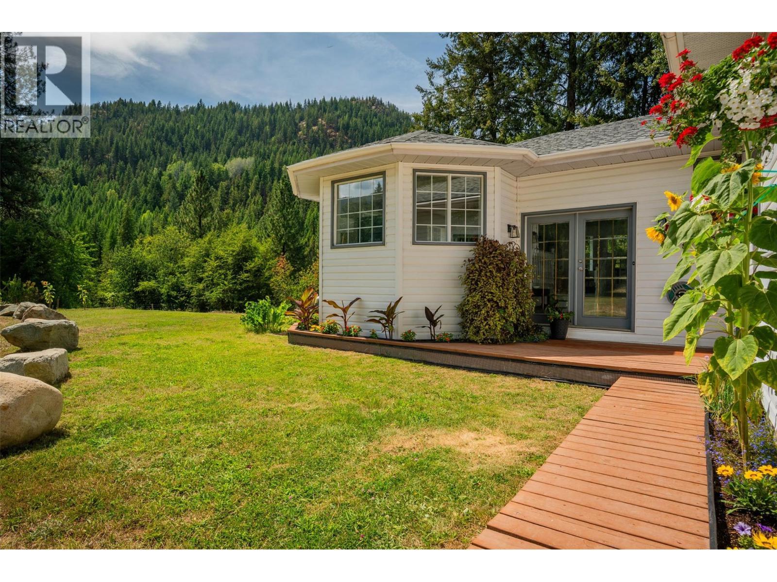 Main house that overlooks the river. - 2697 Osachoff Road, South Slocan, BC - Outdoor