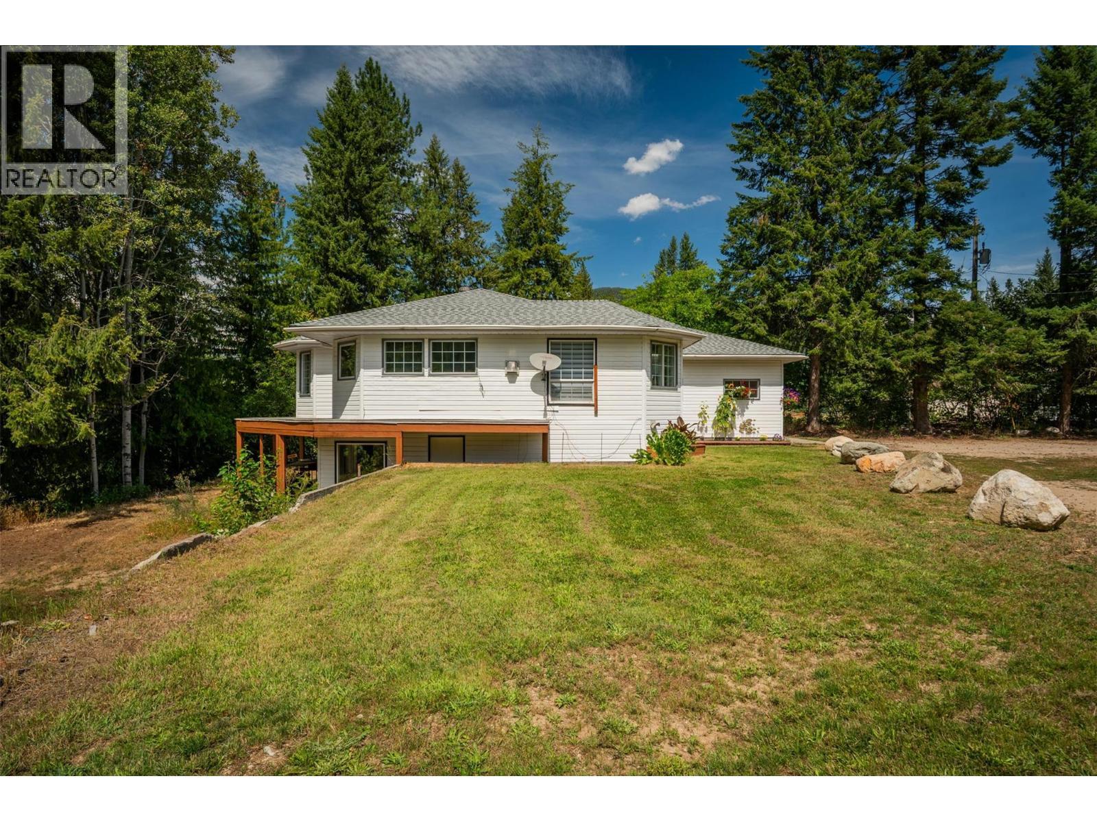 Main house that overlooks the river. - 2697 Osachoff Road, South Slocan, BC - Outdoor With Deck Patio Veranda