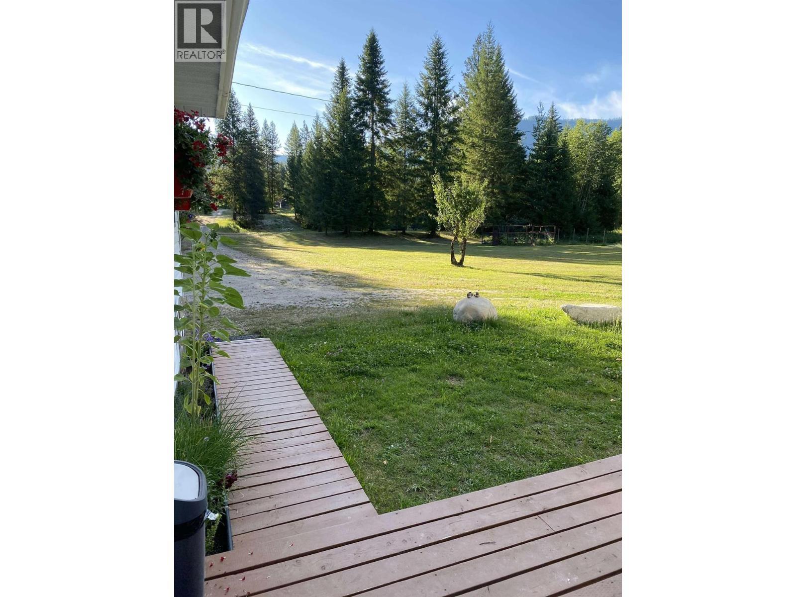 Early morning front porch photo. - 2697 Osachoff Road, South Slocan, BC - Outdoor