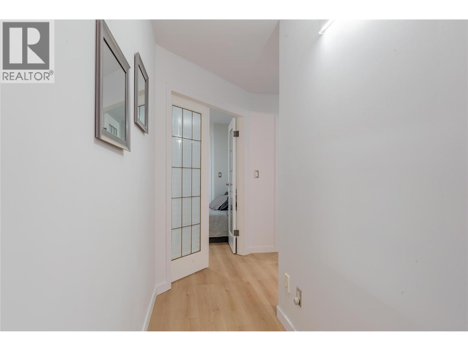 Hallway to bedrooms of main house. - 2697 Osachoff Road, South Slocan, BC - Indoor Photo Showing Other Room