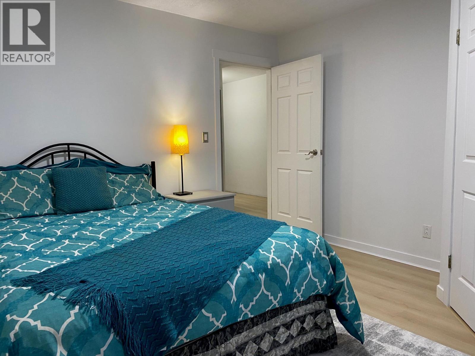 Second bedroom upstairs in the main house. - 2697 Osachoff Road, South Slocan, BC - Indoor Photo Showing Bedroom