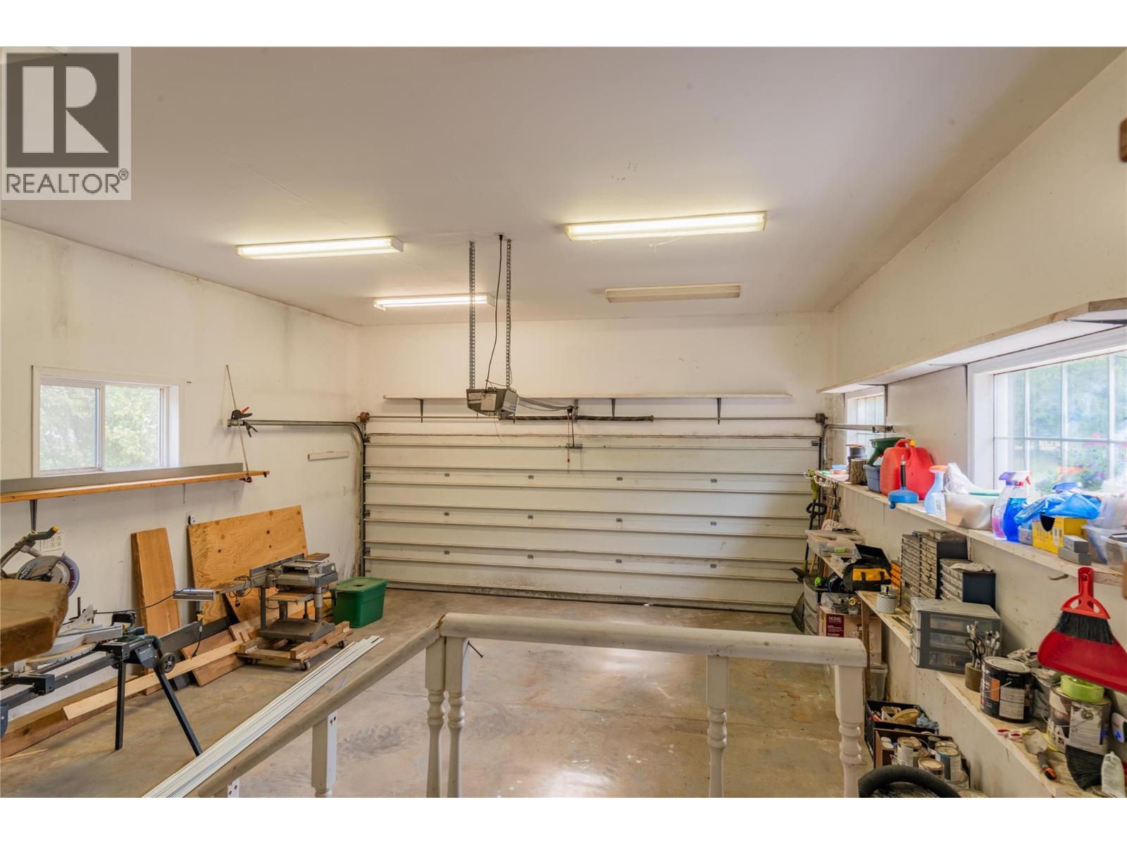 Two car garage in the main house. - 2697 Osachoff Road, South Slocan, BC - Indoor Photo Showing Garage