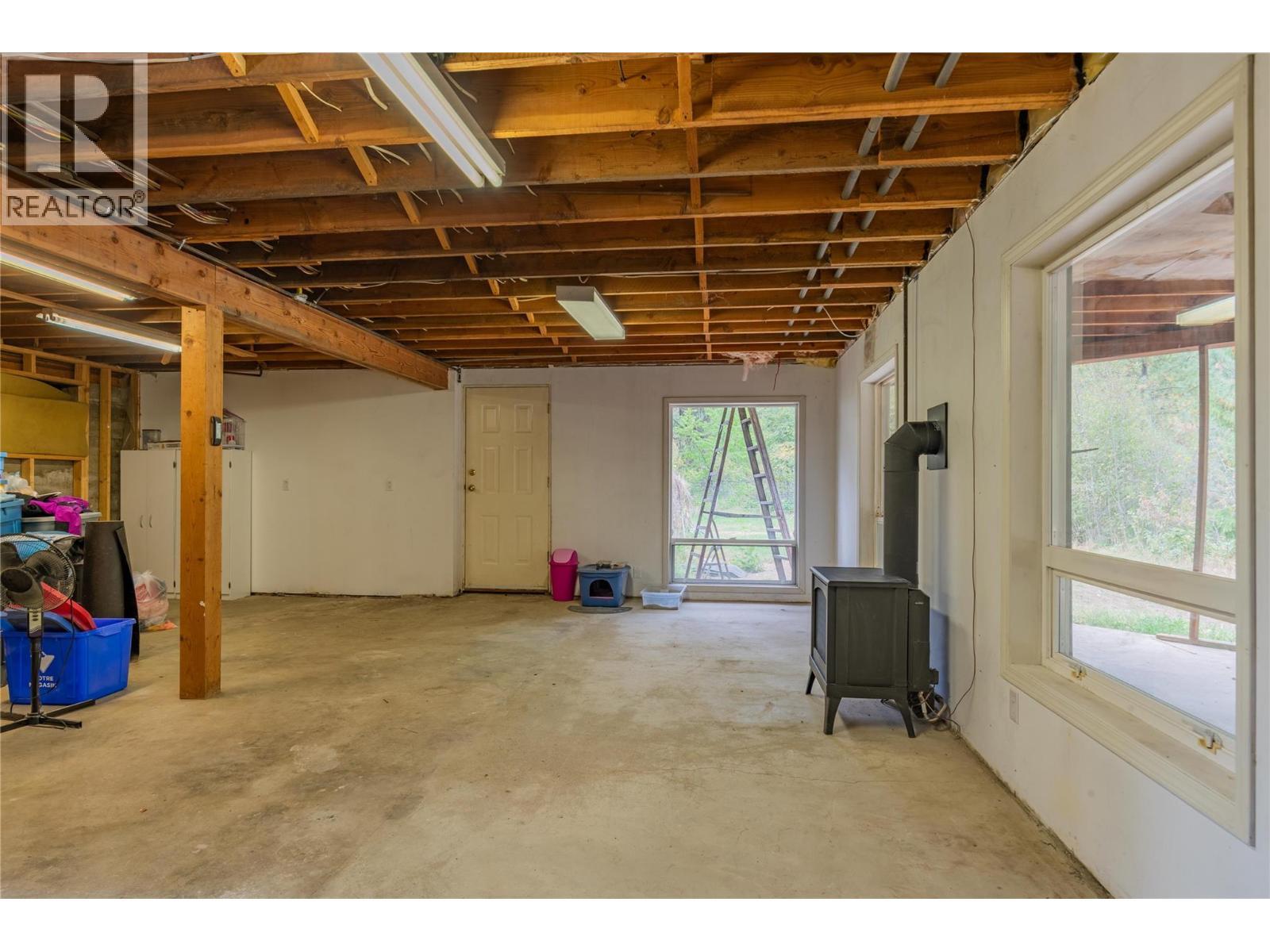 Unfinished basement of the main house. - 2697 Osachoff Road, South Slocan, BC - Indoor Photo Showing Basement