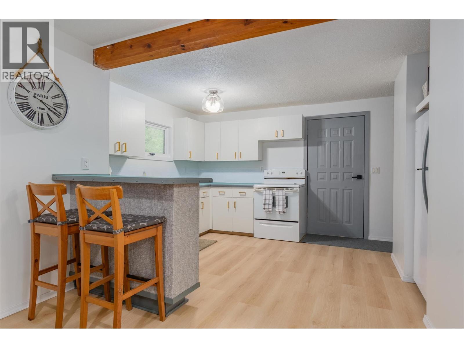 Kitchen bar in the small house. - 2697 Osachoff Road, South Slocan, BC - Indoor Photo Showing Kitchen