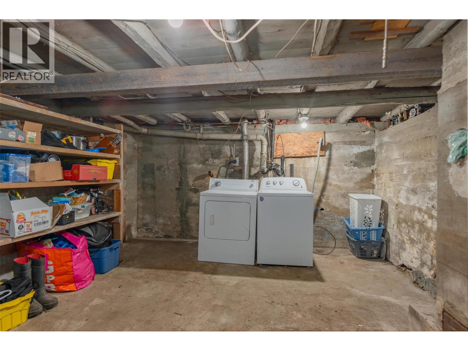 Basement of the small house. - 2697 Osachoff Road, South Slocan, BC - Indoor Photo Showing Laundry Room