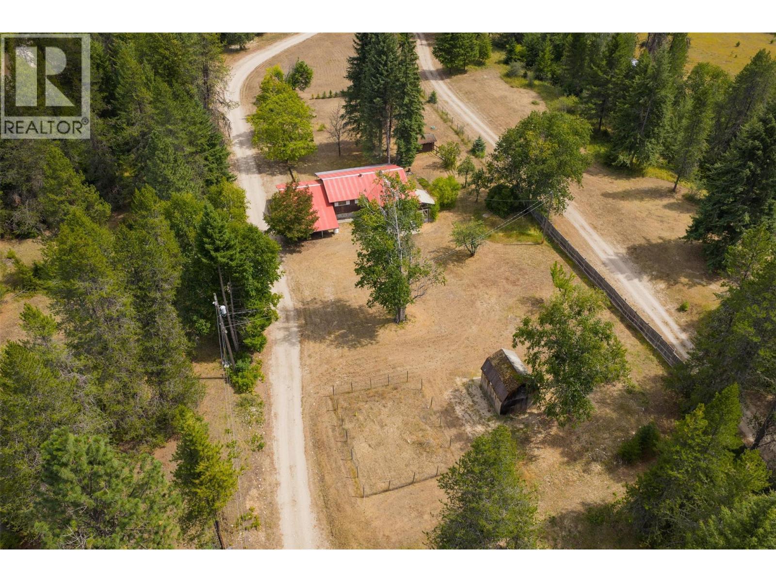 Acreage between the main house and the brown house. - 2697 Osachoff Road, South Slocan, BC - Outdoor With View