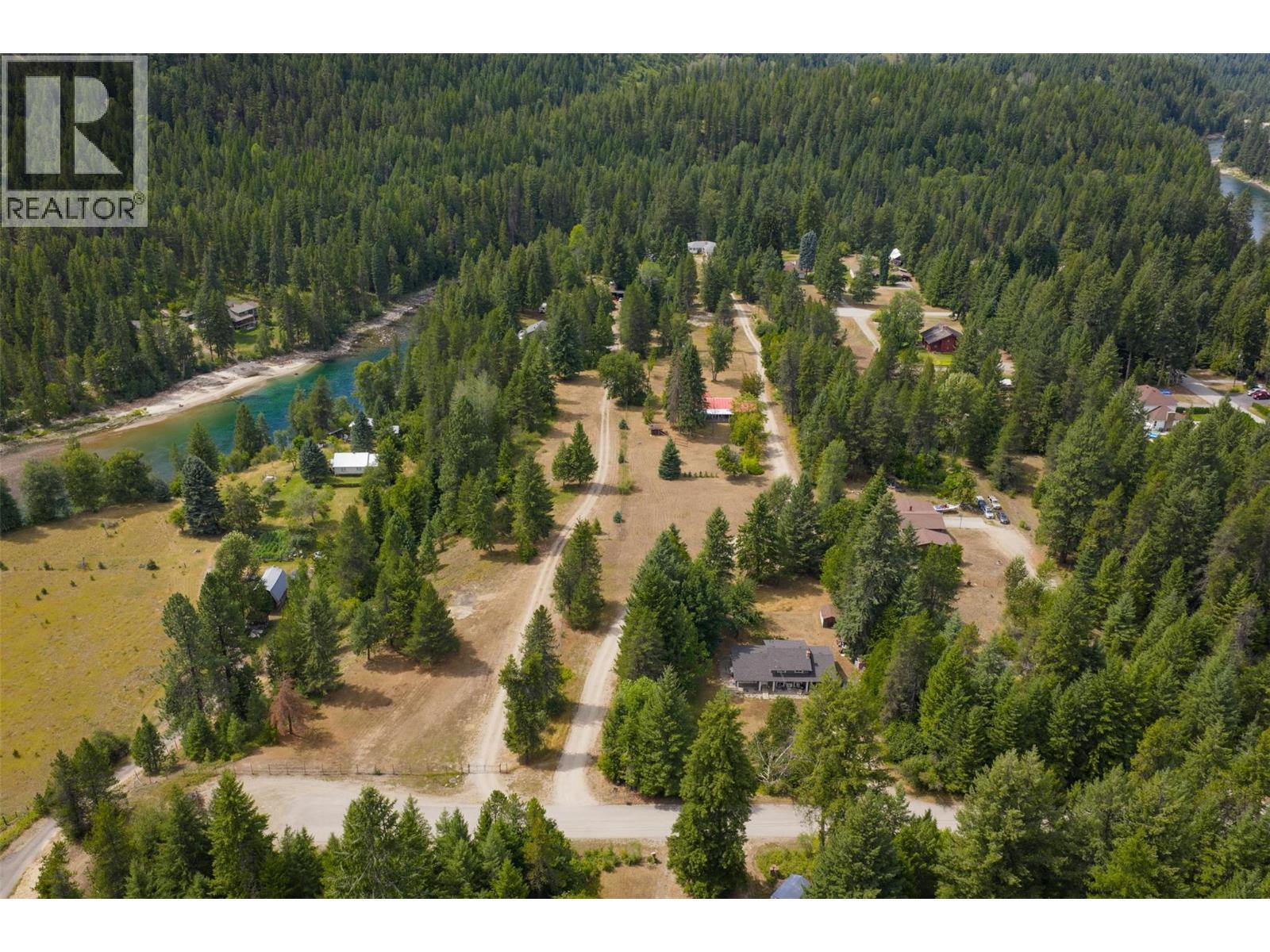 4.74 Acre property with three dwellings and 151 feet of river frontage. - 2697 Osachoff Road, South Slocan, BC - Outdoor With View