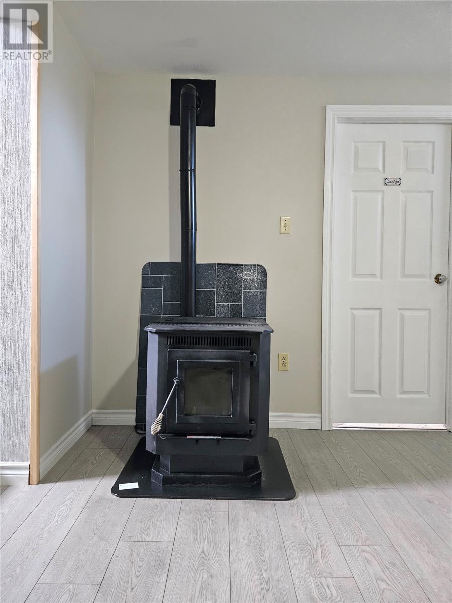 147 Main Road, Heatherton, NL - Indoor With Fireplace